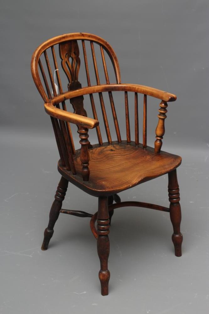 A YEW AND ELM WINDSOR ARMCHAIR Image