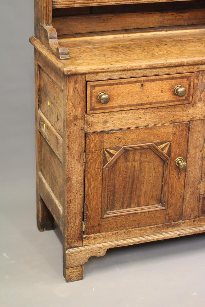 AN ANGLESEY OAK AND PARQUETRY DRESSER Image
