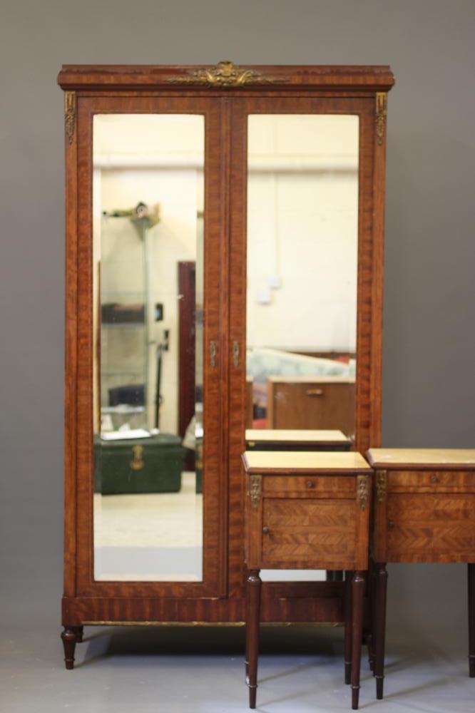 A FRENCH KINGWOOD AND STRING INLAID PART BEDROOM SUITE with gilt metal mounts Image