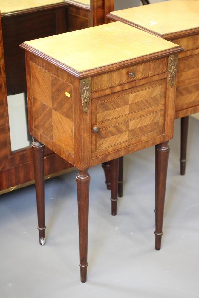 A FRENCH KINGWOOD AND STRING INLAID PART BEDROOM SUITE with gilt metal mounts Image