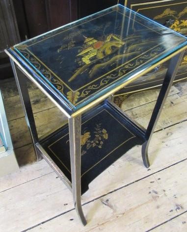 A CHINOISERIE BLACK LACQUERED TEN PIECE BEDROOM SUITE Image