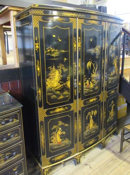 A CHINOISERIE BLACK LACQUERED TEN PIECE BEDROOM SUITE Image