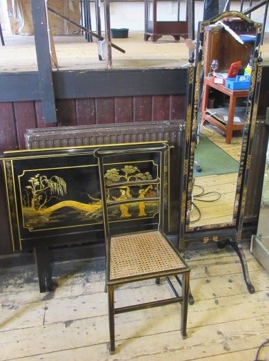 A CHINOISERIE BLACK LACQUERED TEN PIECE BEDROOM SUITE Image