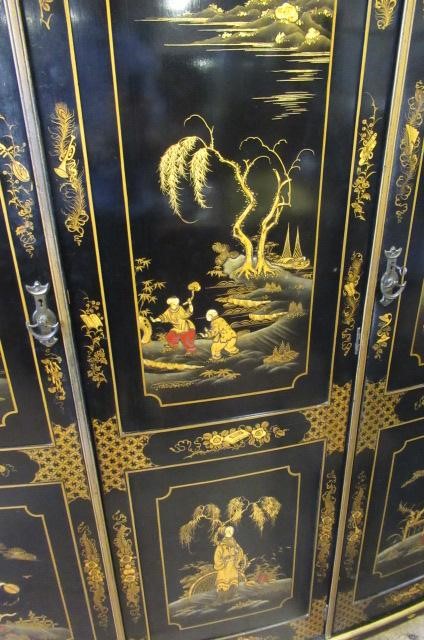A CHINOISERIE BLACK LACQUERED TEN PIECE BEDROOM SUITE Image