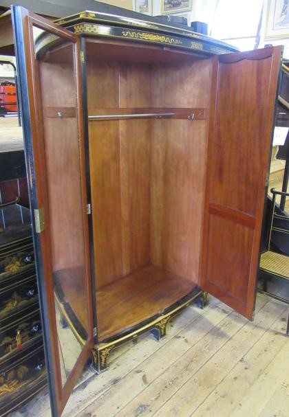 A CHINOISERIE BLACK LACQUERED TEN PIECE BEDROOM SUITE Image