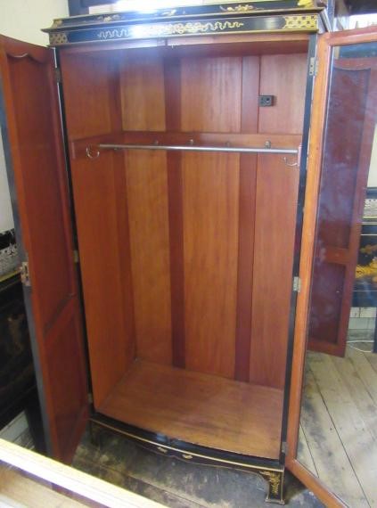 A CHINOISERIE BLACK LACQUERED TEN PIECE BEDROOM SUITE Image