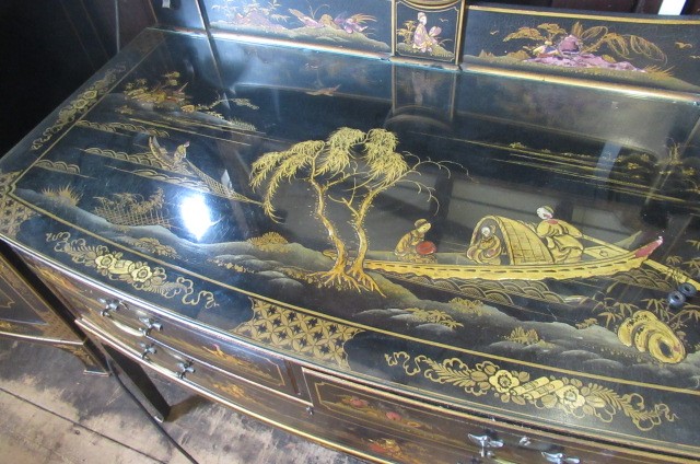 A CHINOISERIE BLACK LACQUERED TEN PIECE BEDROOM SUITE Image