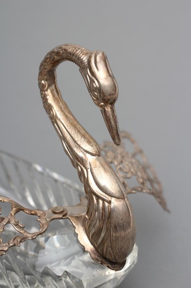 A SILVER MOUNTED CUT GLASS SWAN POSY HOLDER Image