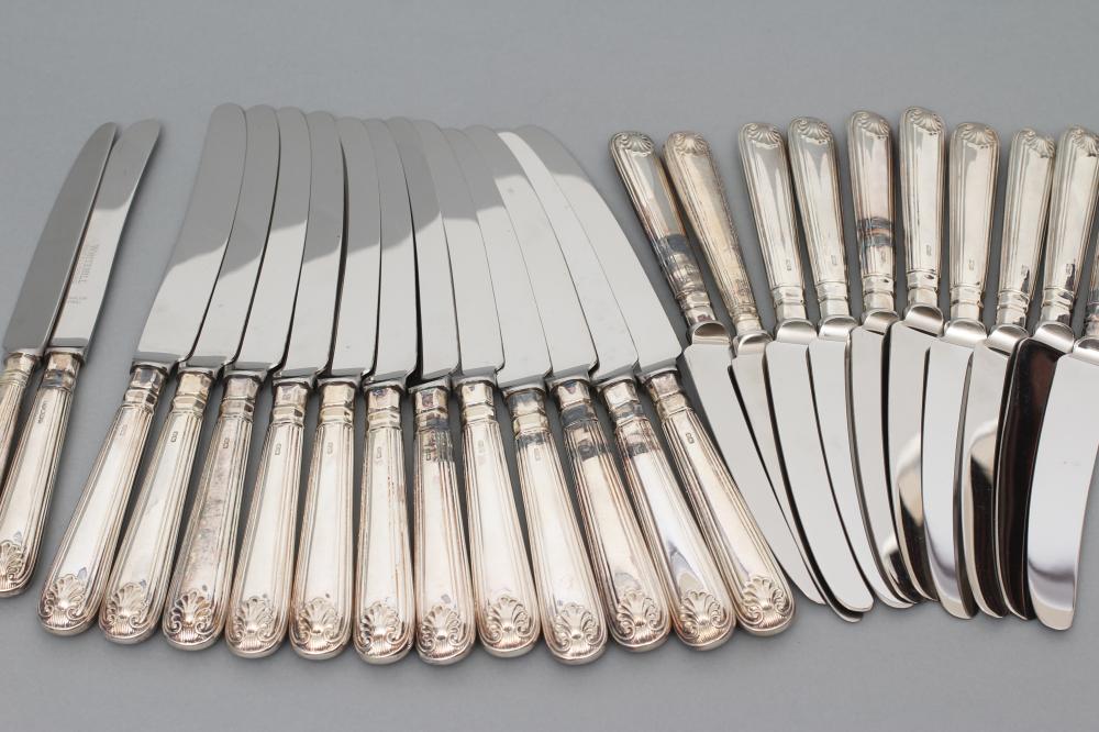 A SET OF TWELVE TABLE AND DESSERT KNIVES Image