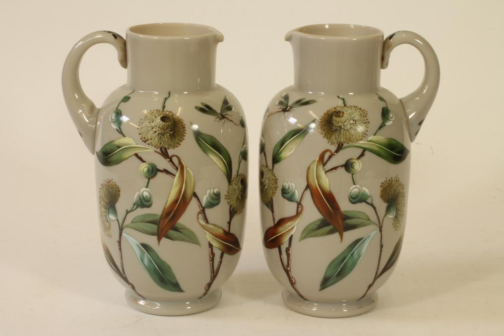 A PAIR OF VICTORIAN GREY OPAQUE GLASS EWERS Image