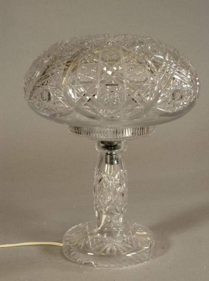A CLEAR GLASS TABLE LAMP BASE AND MUSHROOM SHADE Image