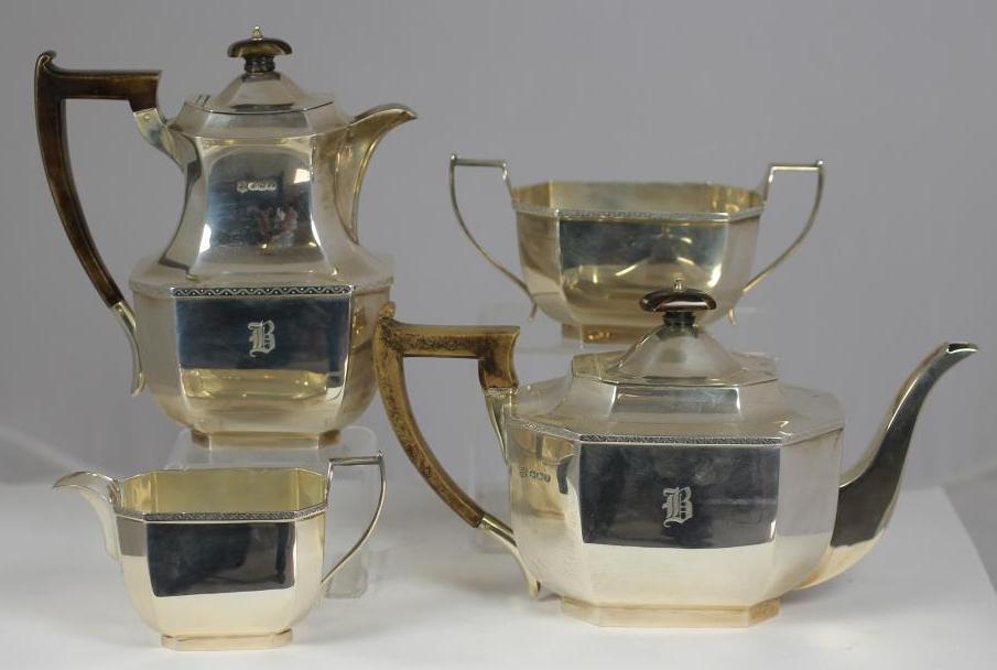 A SILVER COMPOSITE FOUR PIECE TEA AND COFFEE SERVICE Image