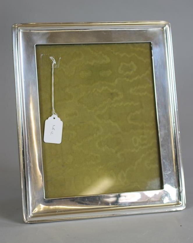 AN EASEL BACK SILVER PHOTOGRAPH FRAME Image