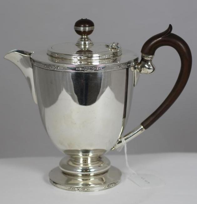 AN ART DECO SILVER COFFEE POT Image