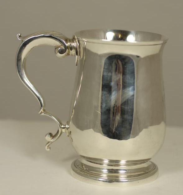 A GEORGE III SILVER MUG Image