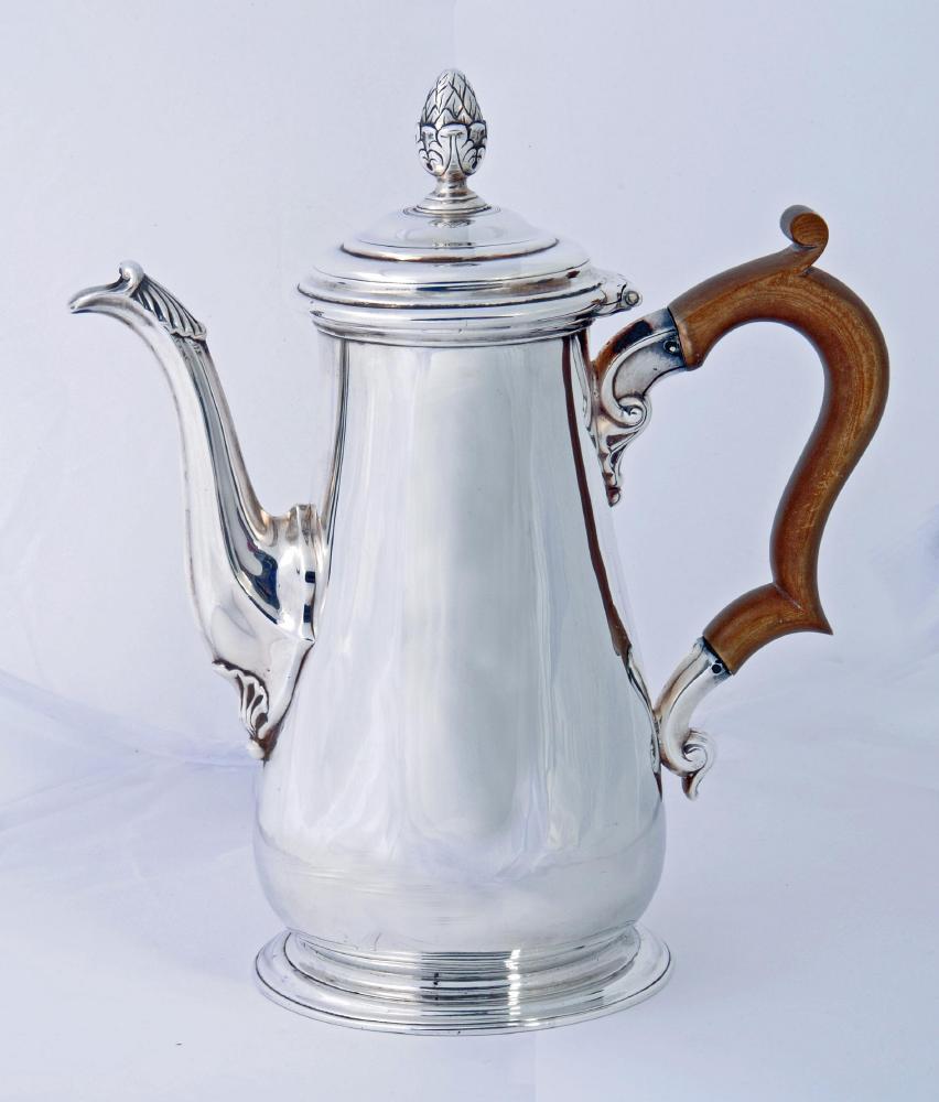 A GEORGE III SILVER COFFEE POT Image