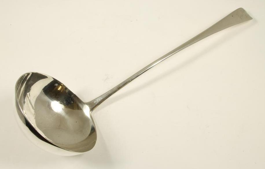 A LATE GEORGE III SILVER SOUP LADLE Image