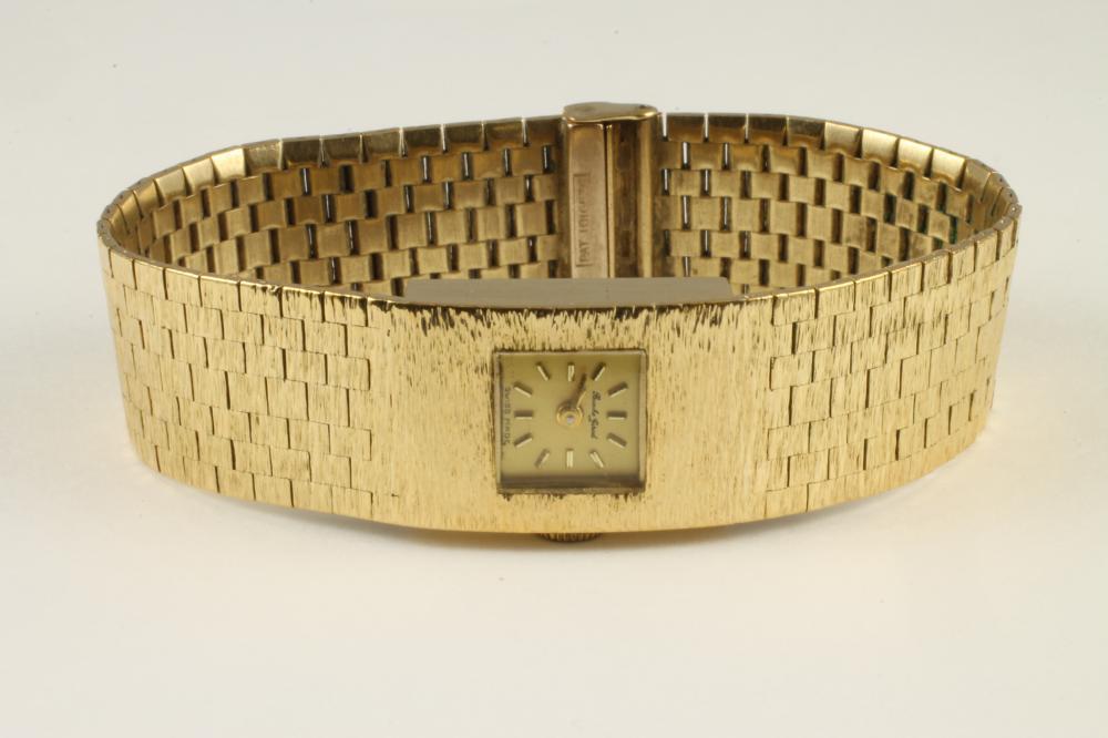 A LADY'S 9CT GOLD BUECHE GIROD WRISTWATCH Image