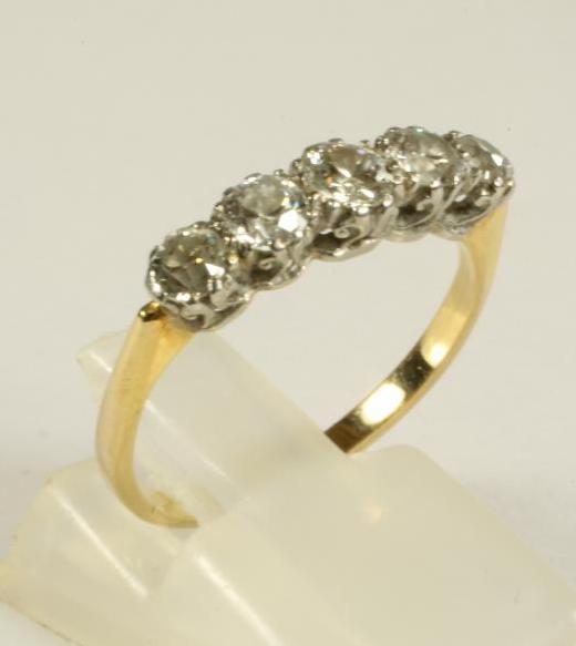 A FIVE STONE DIAMOND RING Image