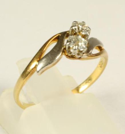 A TWO STONE DIAMOND RING Image