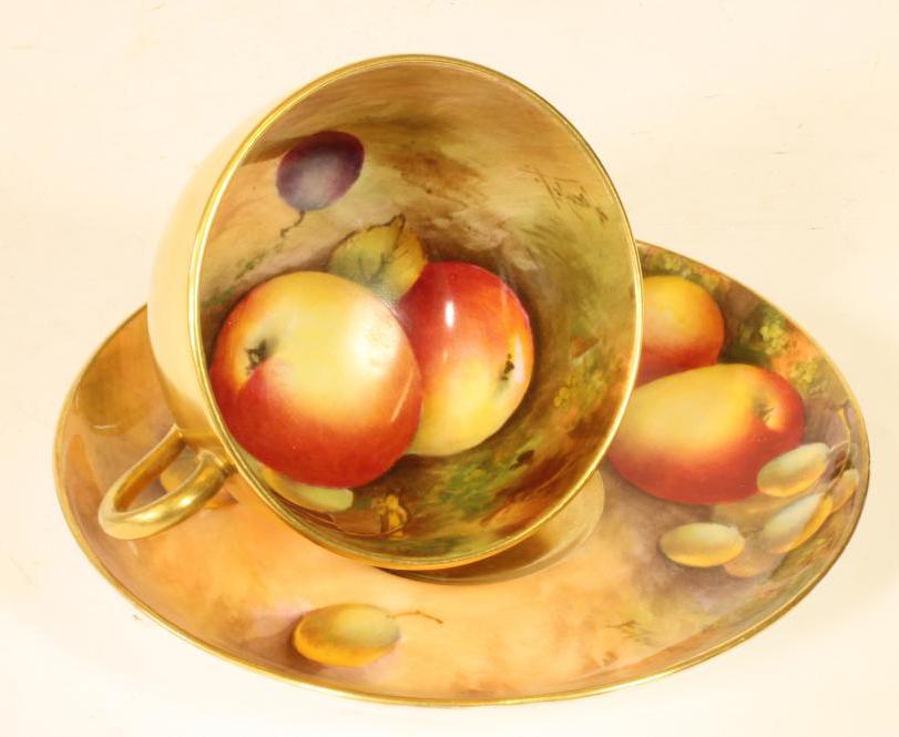 A ROYAL WORCESTER CHINA TEACUP AND SAUCER Image