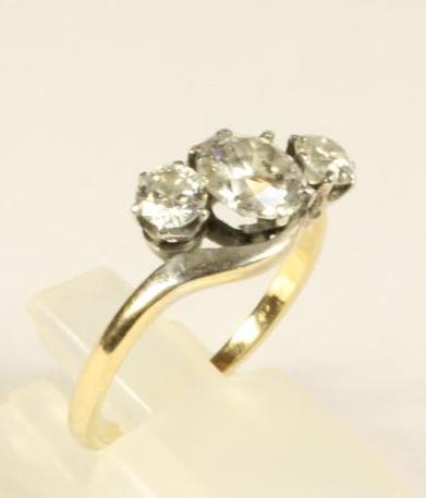 A THREE STONE DIAMOND RING Image