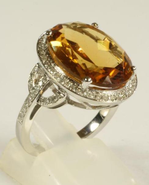 A CITRINE AND DIAMOND DRESS RING Image
