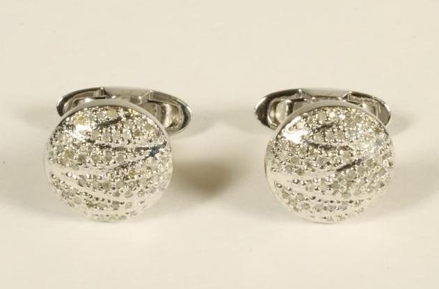 A PAIR OF DIAMOND CUFFLINKS Image