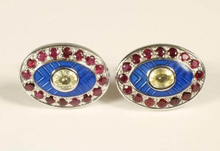 A PAIR OF RUBY CUFFLINKS Image