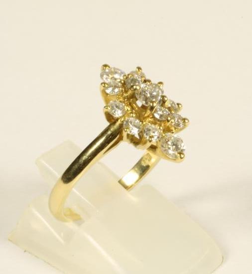 A DIAMOND CLUSTER RING Image