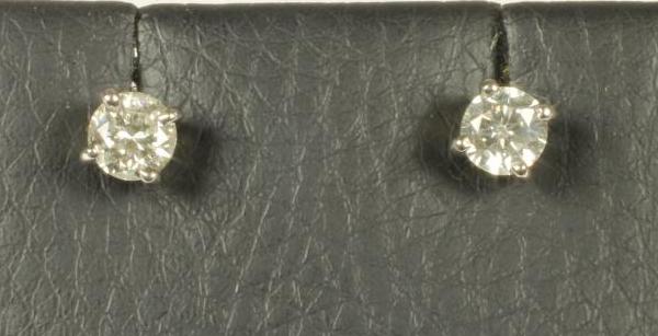A PAIR OF DIAMOND EAR STUDS Image