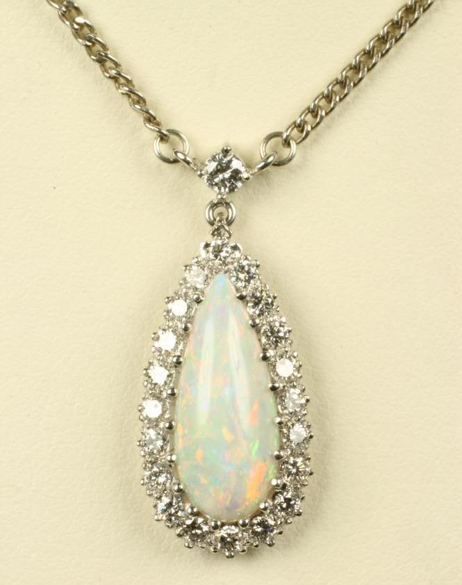 AN OPAL AND DIAMOND PENDANT Image