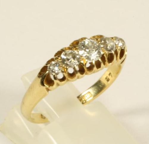 A VICTORIAN FIVE STONE DIAMOND RING Image