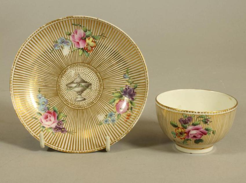 A CHELSEA DERBY PORCELAIN TEA BOWL AND SAUCER Image