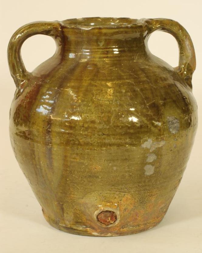AN ENGLISH EARTHENWARE CIDER FLAGON Image