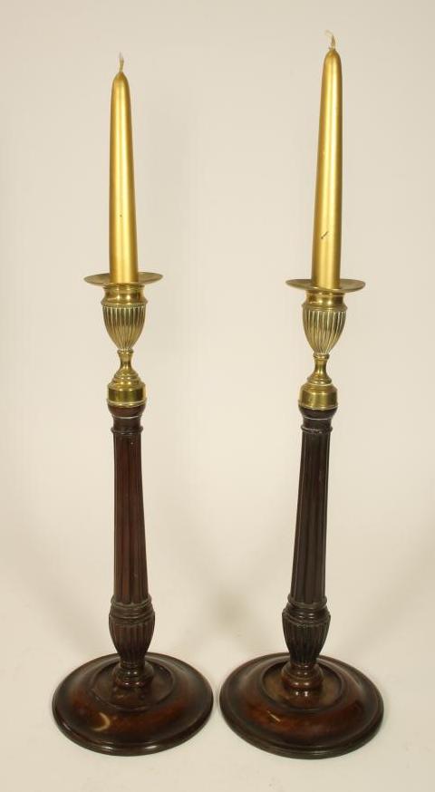 A PAIR OF GEORGIAN DESIGN MAHOGANY CANDLESTICKS Image