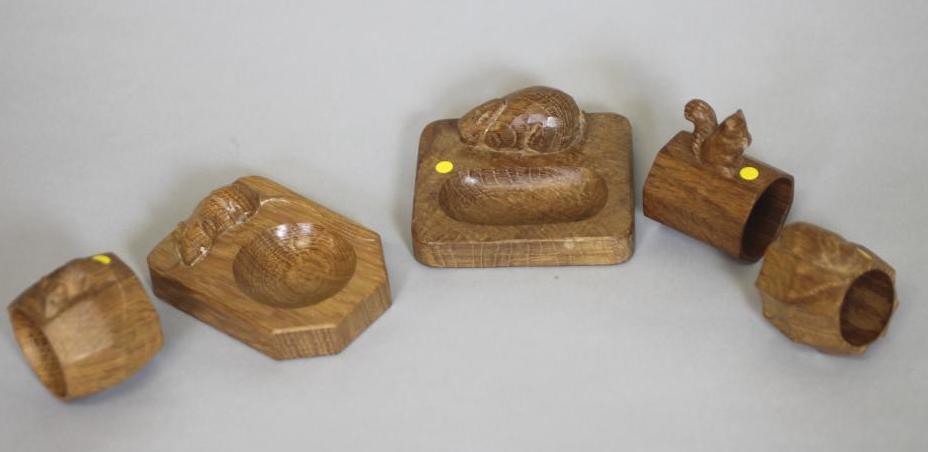AN ADZED OAK TRINKET TRAY by Robert "Mouseman" Thompson of canted oblong form with circular Image