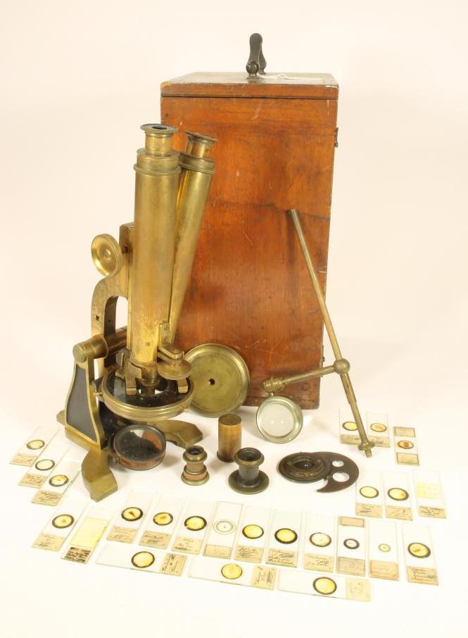 A 19TH CENTURY BRASS AND BLACK LACQUERED BINOCULAR MICROSCOPE signed W. Heath Image