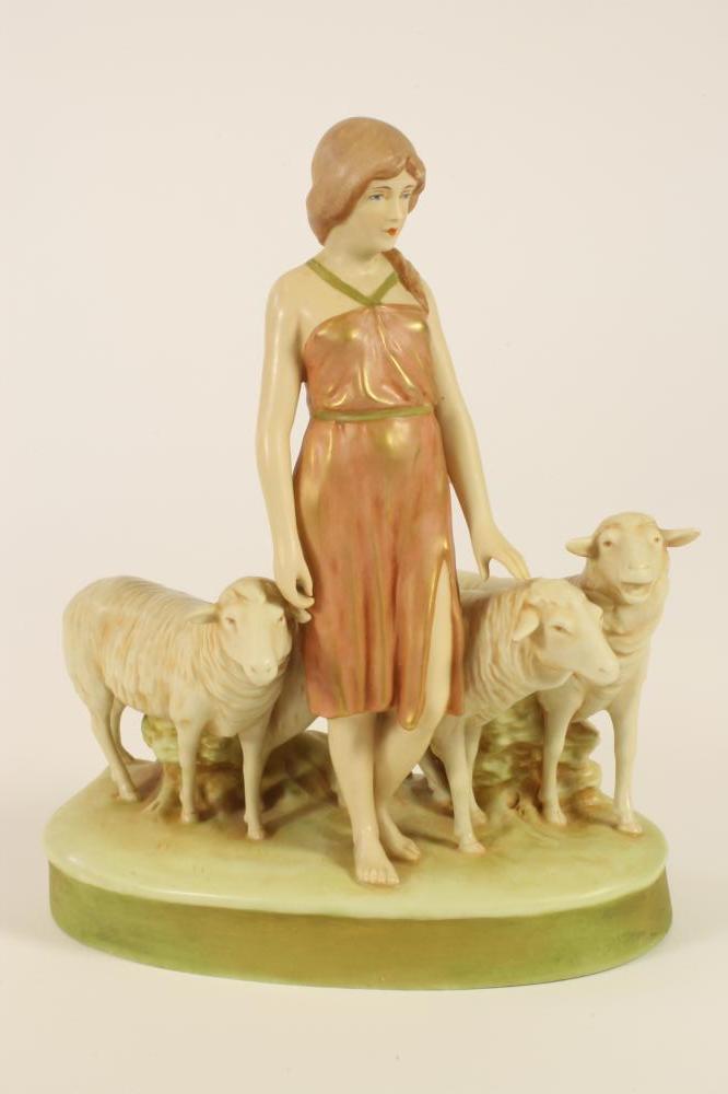 A ROYAL DUX PORCELAIN FIGURE GROUP Image