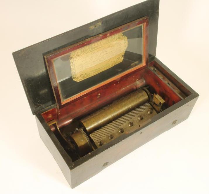 A SWISS MUSICAL BOX playing six airs as listed on the tune sheet Image