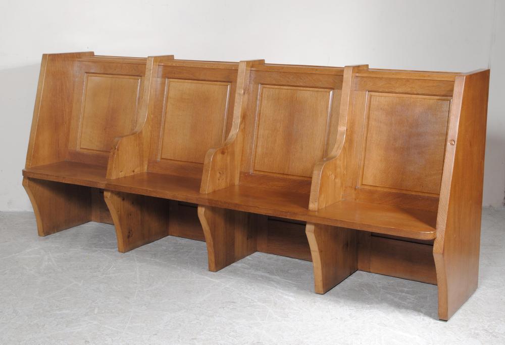 AN OAK BENCH by Robert "Mouseman" Thompson modelled to sit four with shaped arm rests Image
