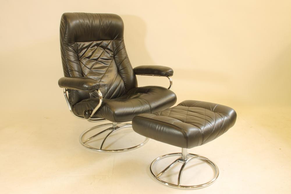 AN EKARNES STRESSLESS RECLINER CHAIR AND STOOL Image