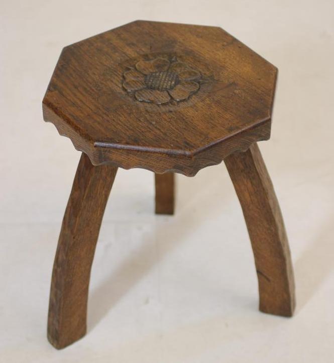 AN ADZED OAK THREE LEGGED STOOL by Herbert Bird of York Image