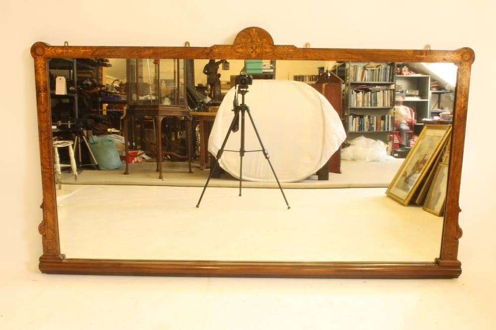 A VICTORIAN WALNUT AND FOLIATE MARQUETRY FRAMED WALL MIRROR of oblong form with arched crest Image