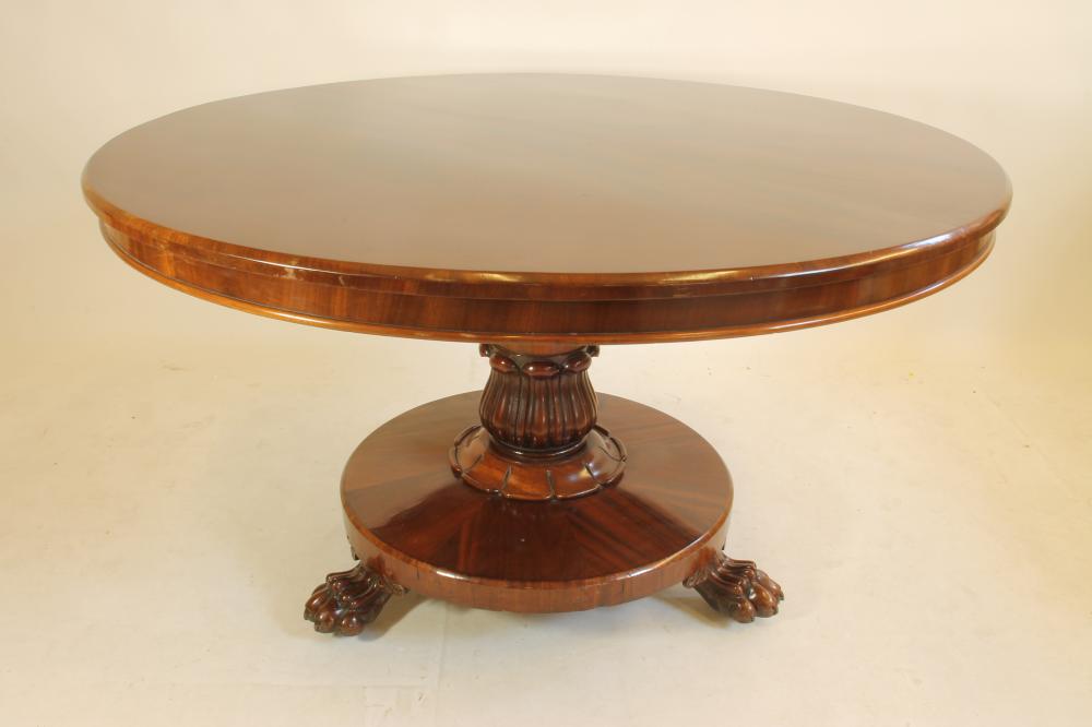 AN EARLY VICTORIAN MAHOGANY BREAKFAST TABLE Image