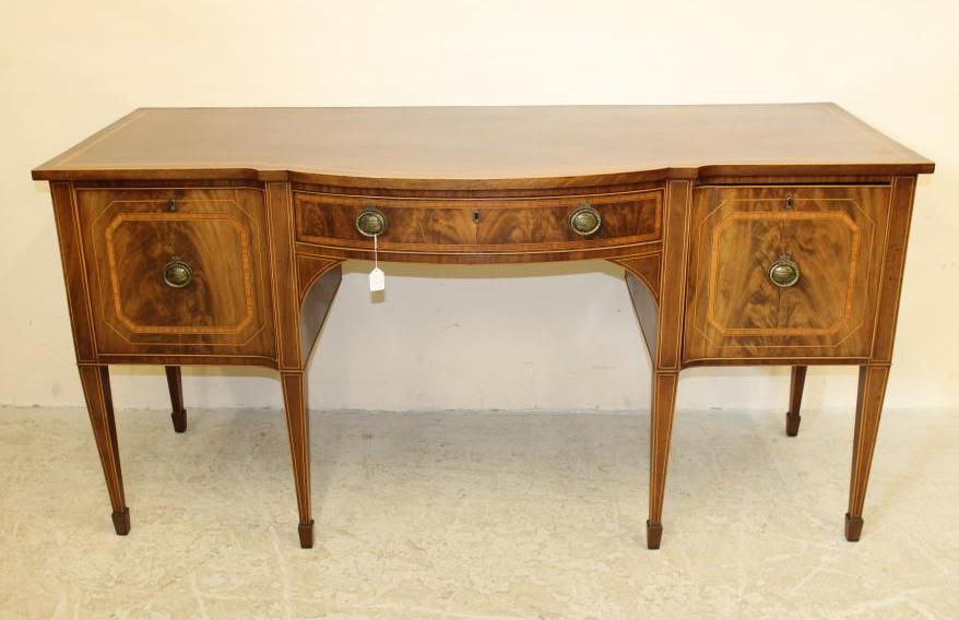 A GEORGIAN MAHOGANY AND SATINWOOD BANDED SIDEBOARD Image