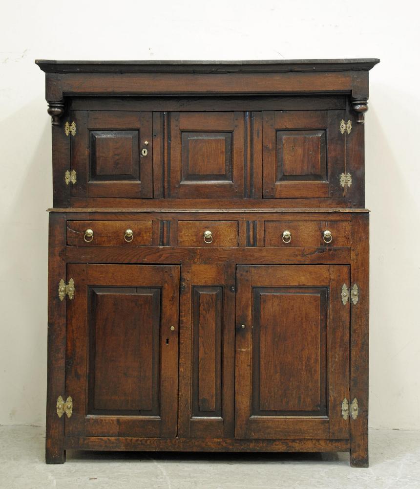 AN OAK PRESS CUPBOARD Image