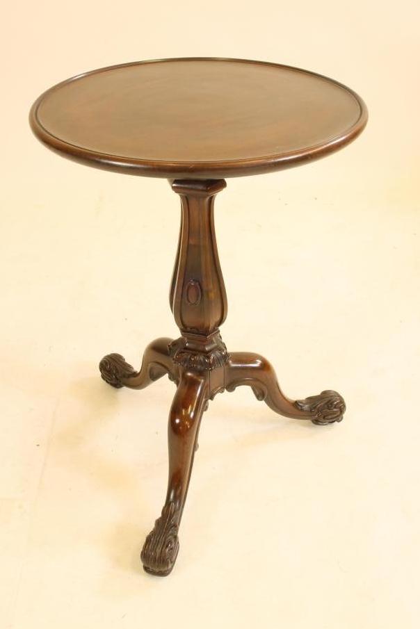 A MAHOGANY TRIPOD TABLE Image