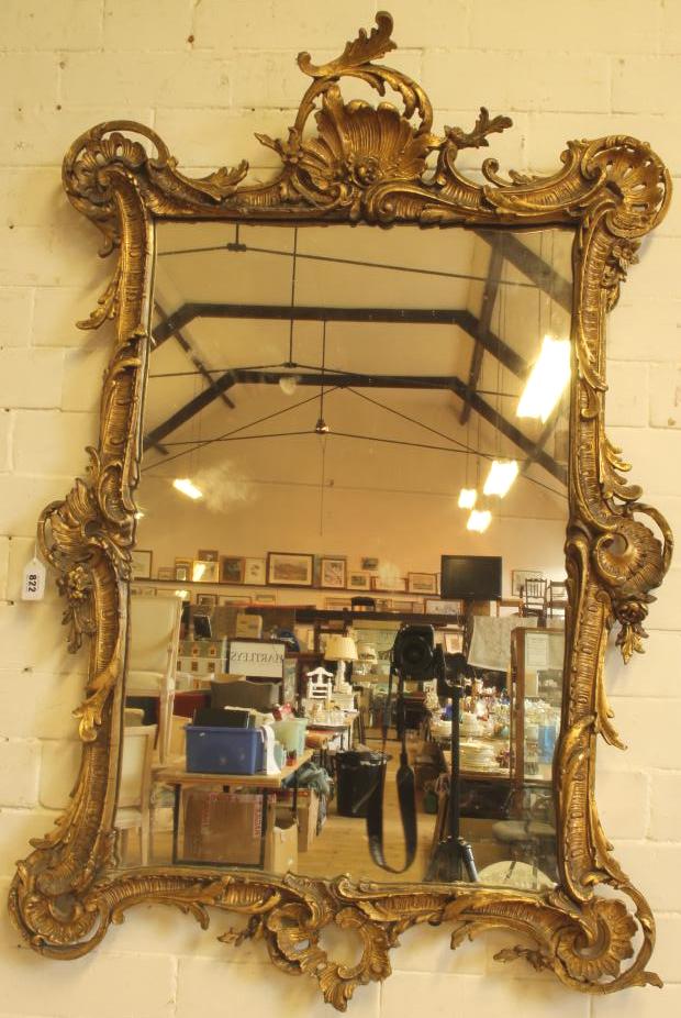 A VICTORIAN GILT GESSO PIER GLASS in the Georgian rococo style Image