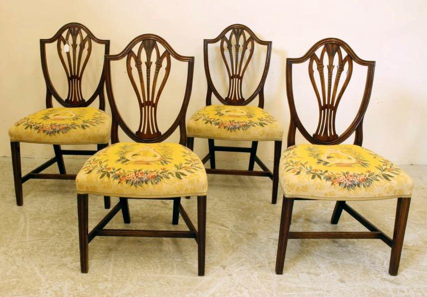 A SET OF FOUR GEORGE III MAHOGANY DINING CHAIRS Image